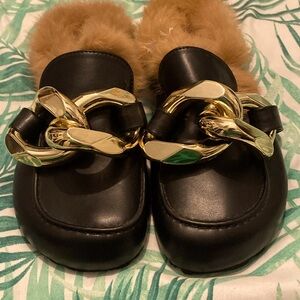 Azealea Wang used black slip on for loafers with gold chunky link trim